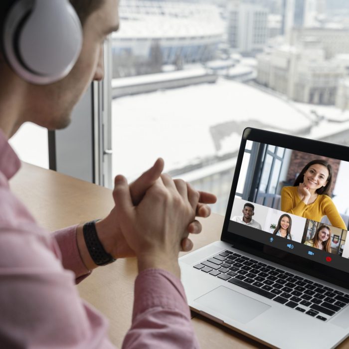 man-having-online-video-call-with-coworkers